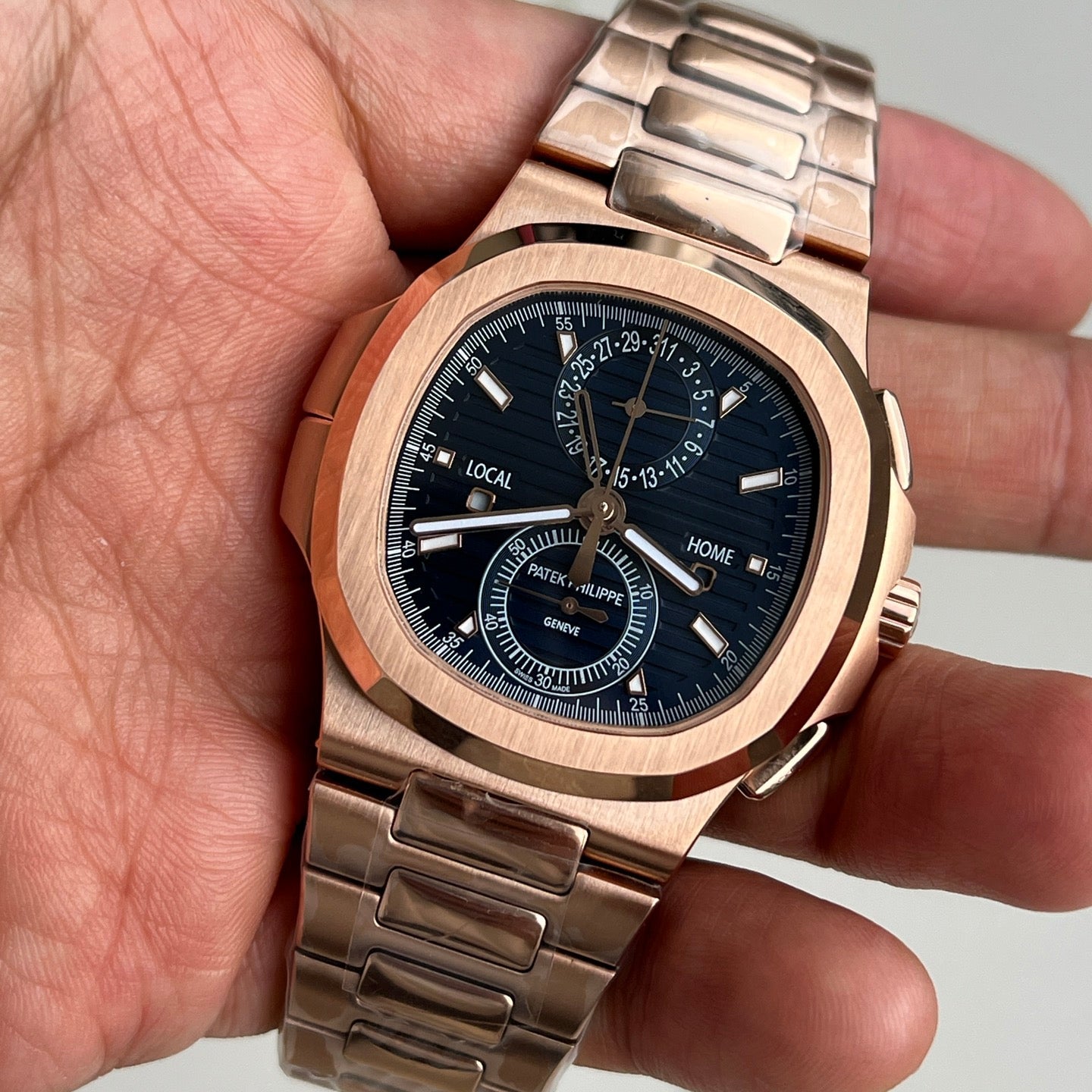 Patek Philippe Nautilus Travel Time Chronograph 5990/1R-001 in Rose Gold with Blue Sunburst Dial