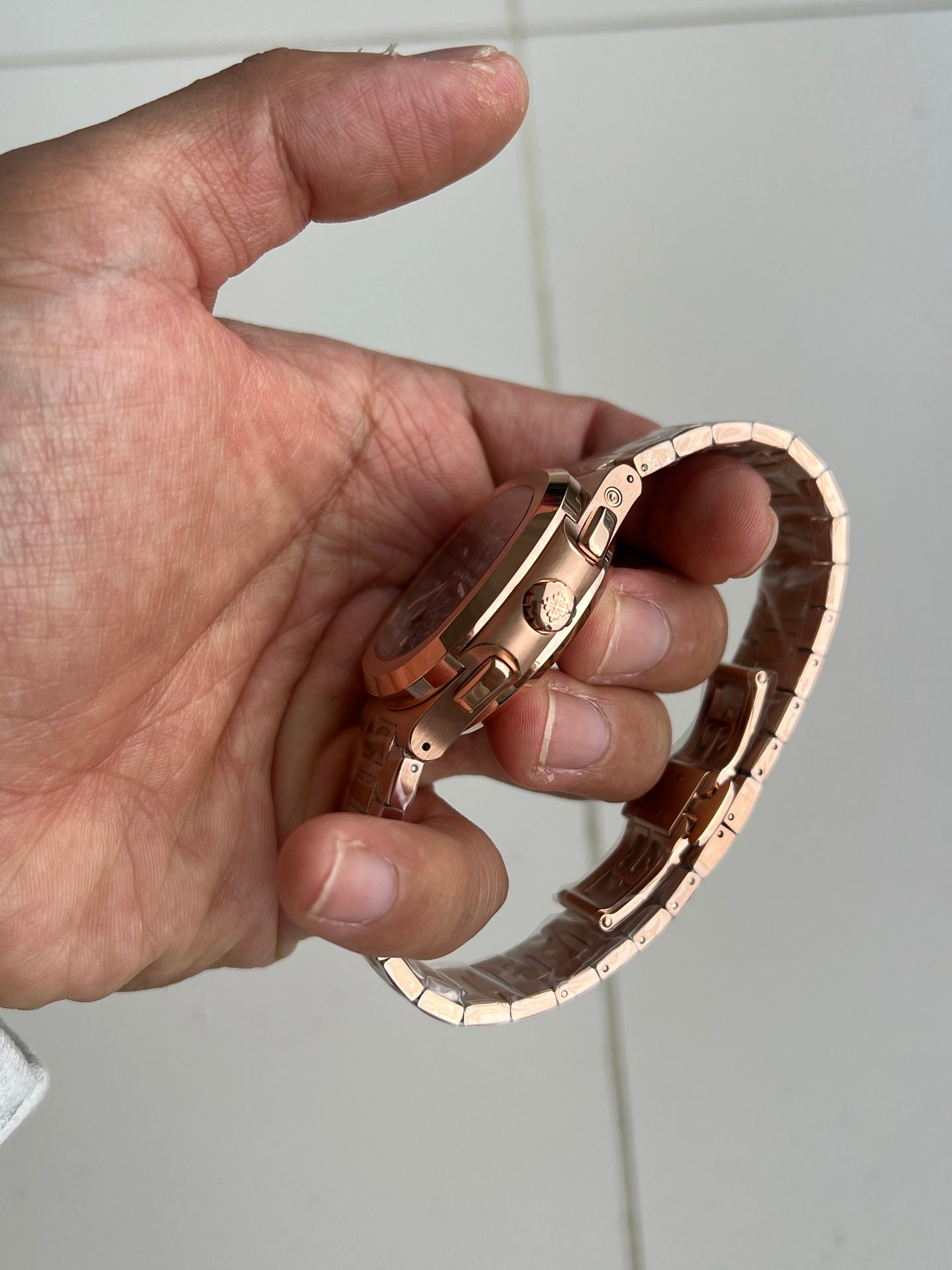 Patek Philippe Nautilus Travel Time Chronograph 5990/1R-001 in Rose Gold with Blue Sunburst Dial