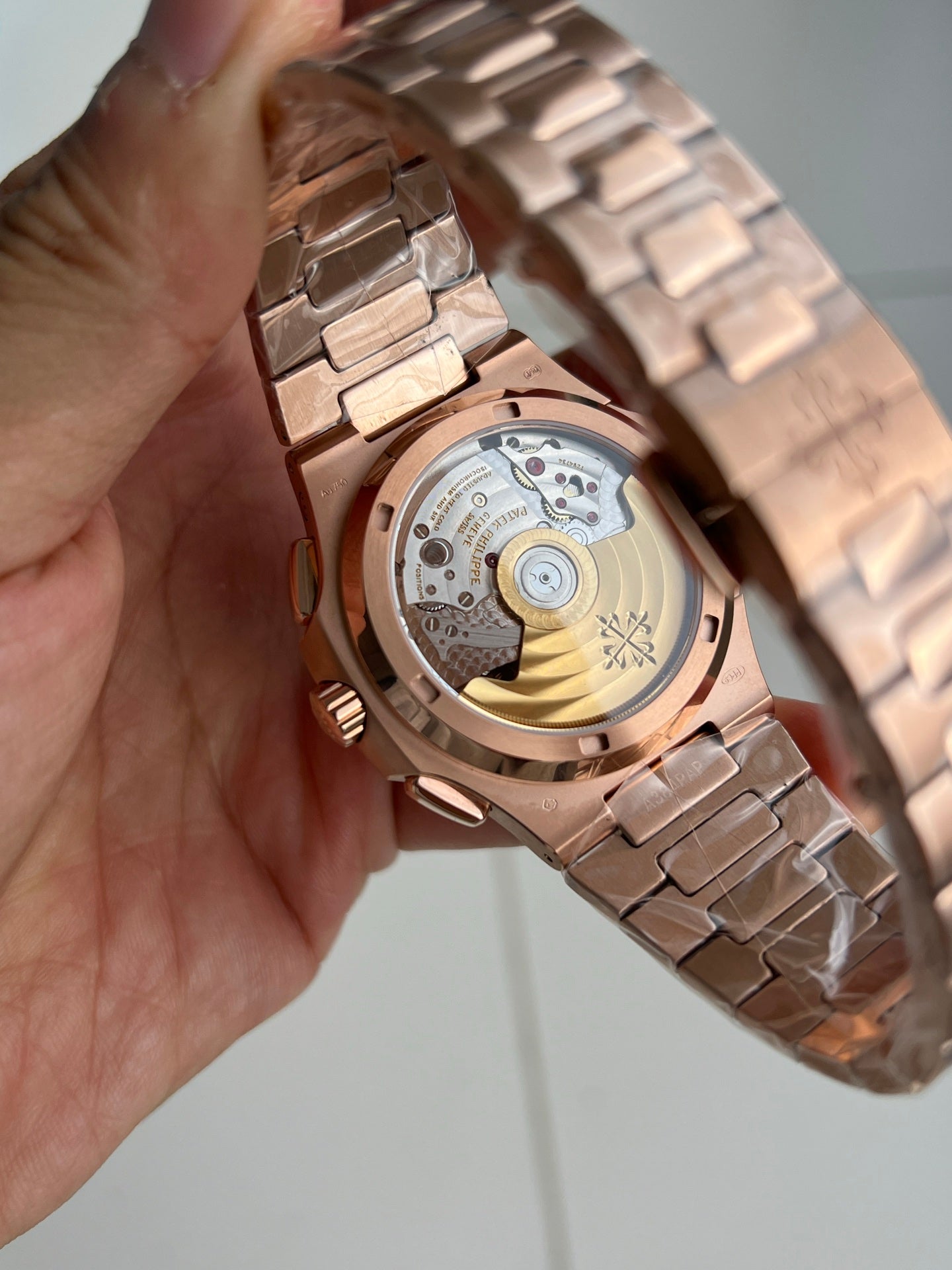 Patek Philippe Nautilus Travel Time Chronograph 5990/1R-001 in Rose Gold with Blue Sunburst Dial