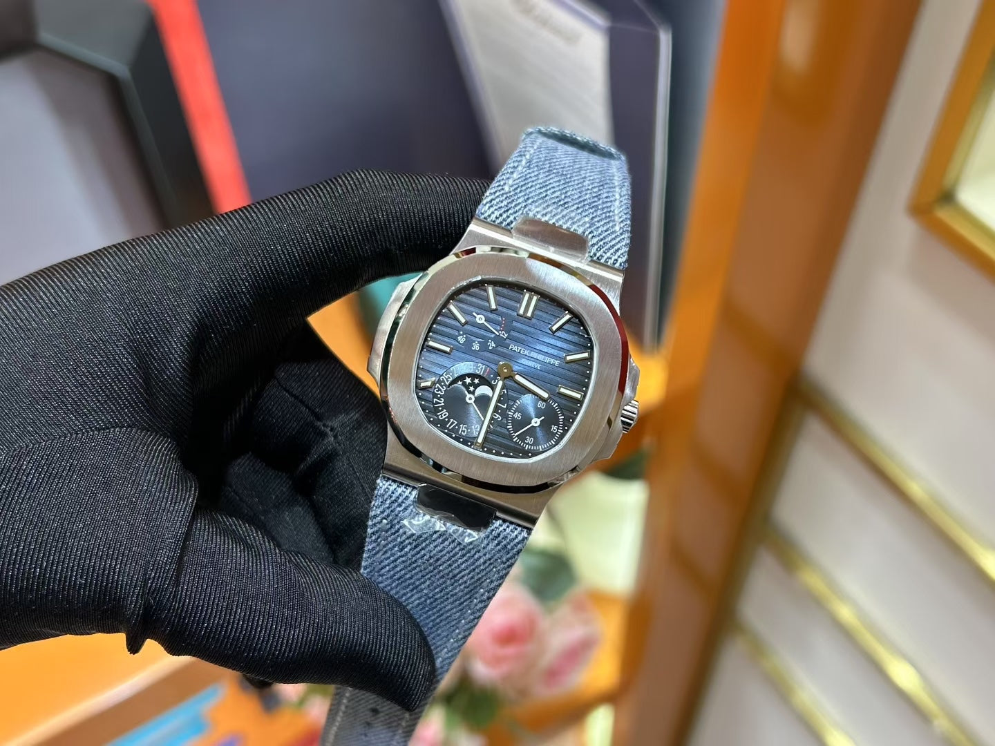 Patek Philippe Nautilus 5712 Luxury Stainless Steel Watch with Moonphase & Power Reserve