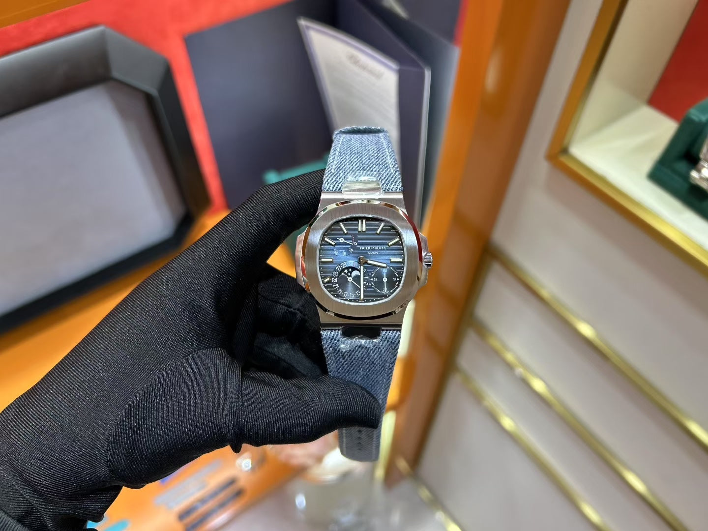 Patek Philippe Nautilus 5712 Luxury Stainless Steel Watch with Moonphase & Power Reserve