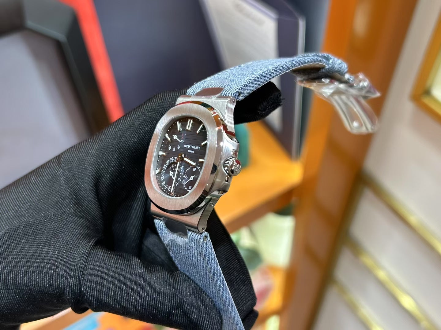Patek Philippe Nautilus 5712 Luxury Stainless Steel Watch with Moonphase & Power Reserve