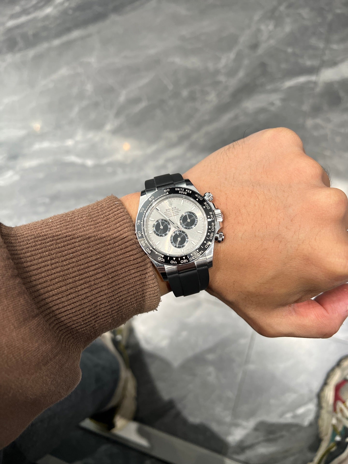 Rolex Oyster Perpetual Cosmograph Daytona in 18k White Gold with Steel/Silver Dial on Black Oysterflex Bracelet