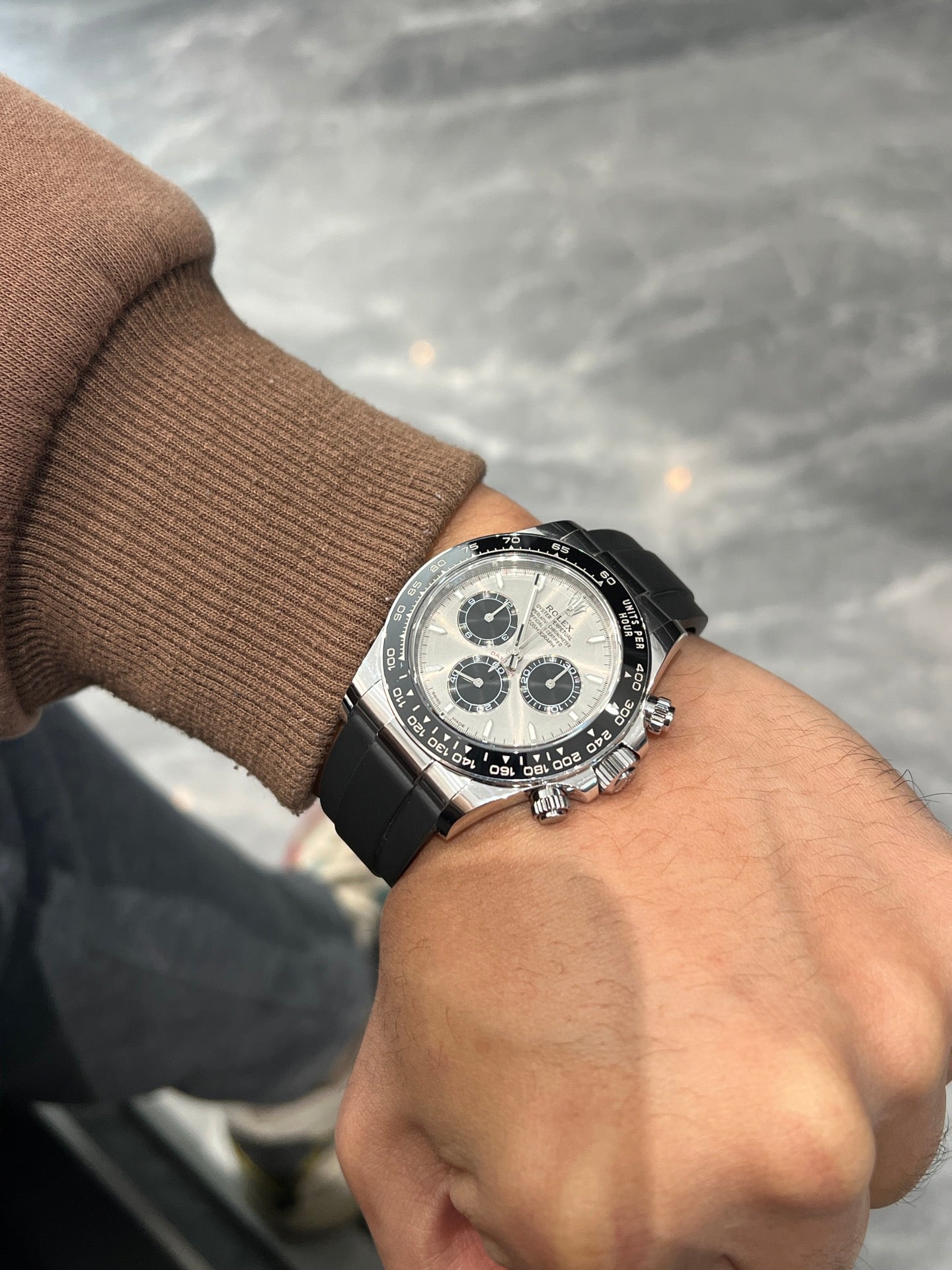 Rolex Oyster Perpetual Cosmograph Daytona in 18k White Gold with Steel/Silver Dial on Black Oysterflex Bracelet