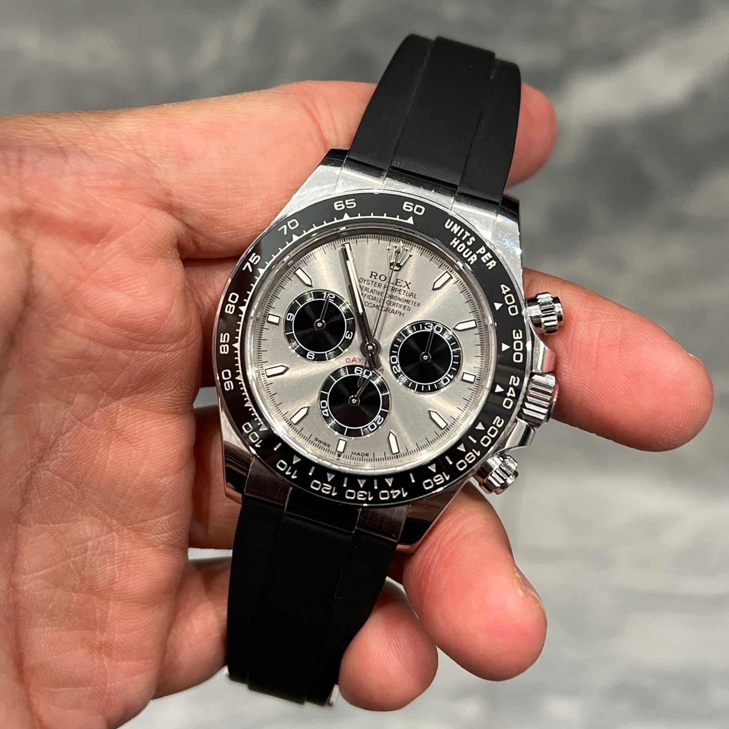 Rolex Oyster Perpetual Cosmograph Daytona in 18k White Gold with Steel/Silver Dial on Black Oysterflex Bracelet