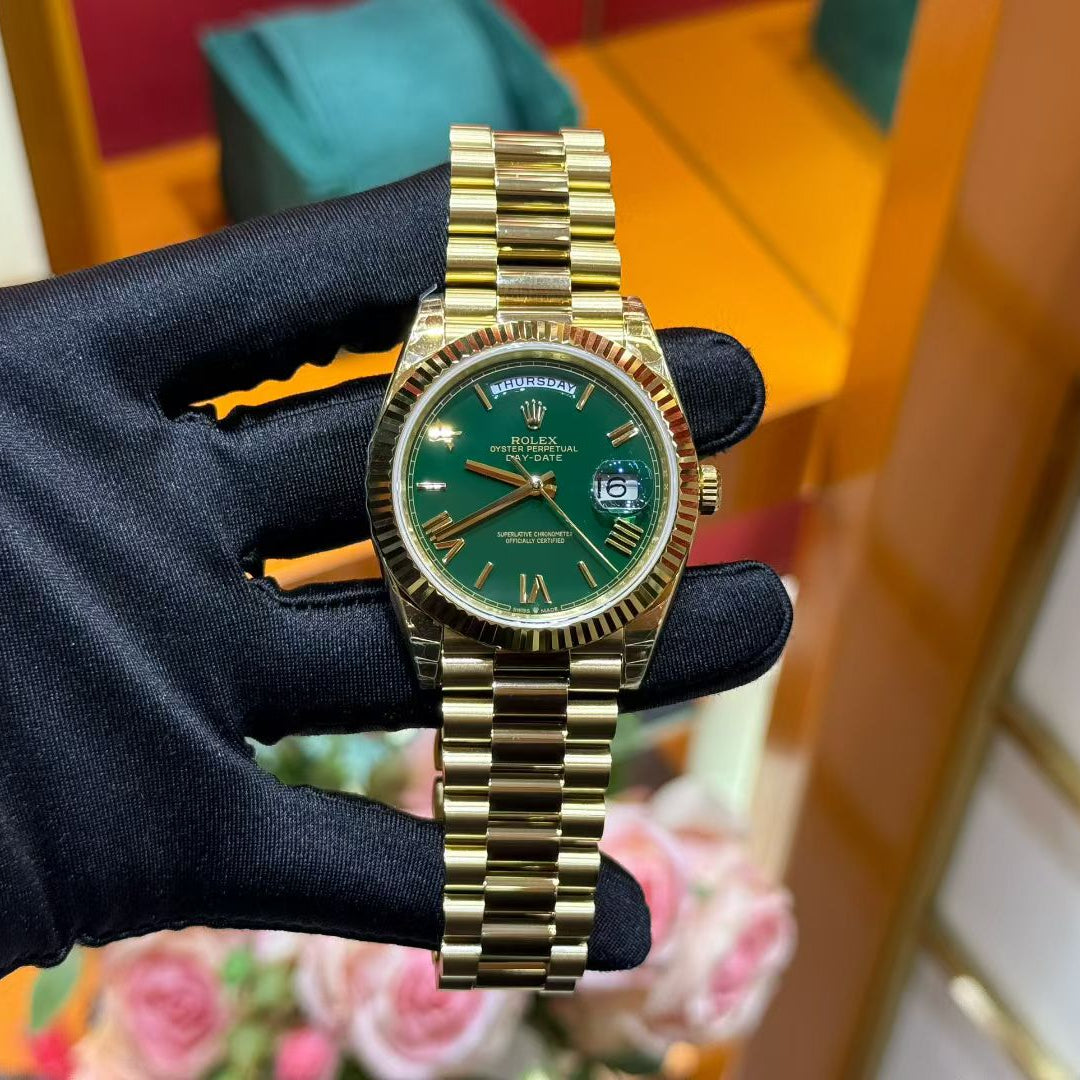 Rolex Day-Date 40 Yellow Gold with Green Dial & President Bracelet
