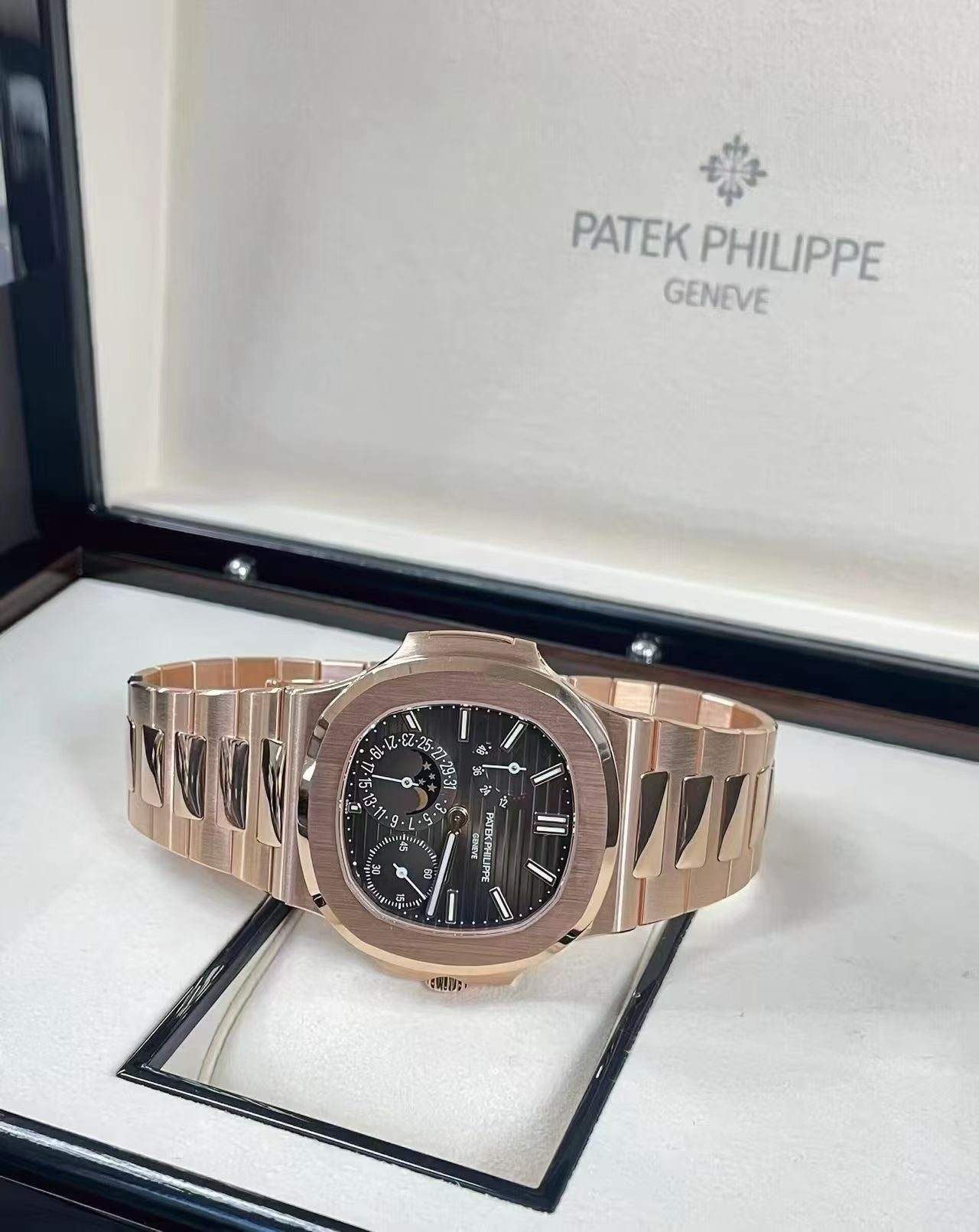 Patek Philippe Nautilus 5712/1R-001 Moon Phases in Rose Gold with Brown Sunburst Dial