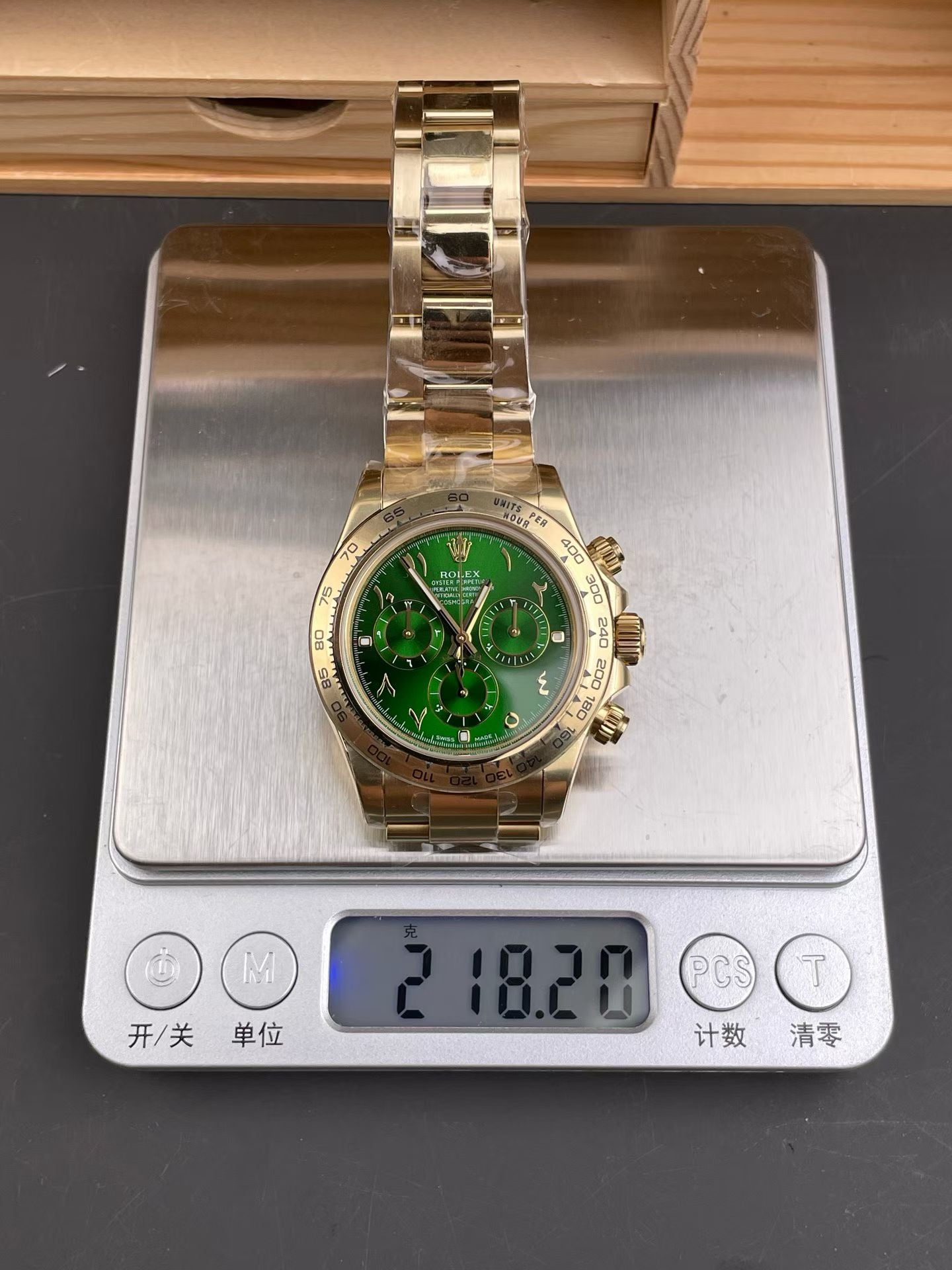 Rolex Cosmograph Daytona in Yellow Gold with Green Dial & Arabic Numerals