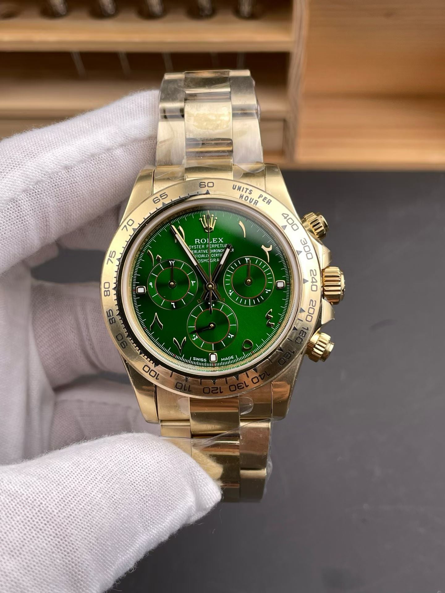 Rolex Cosmograph Daytona in Yellow Gold with Green Dial & Arabic Numerals