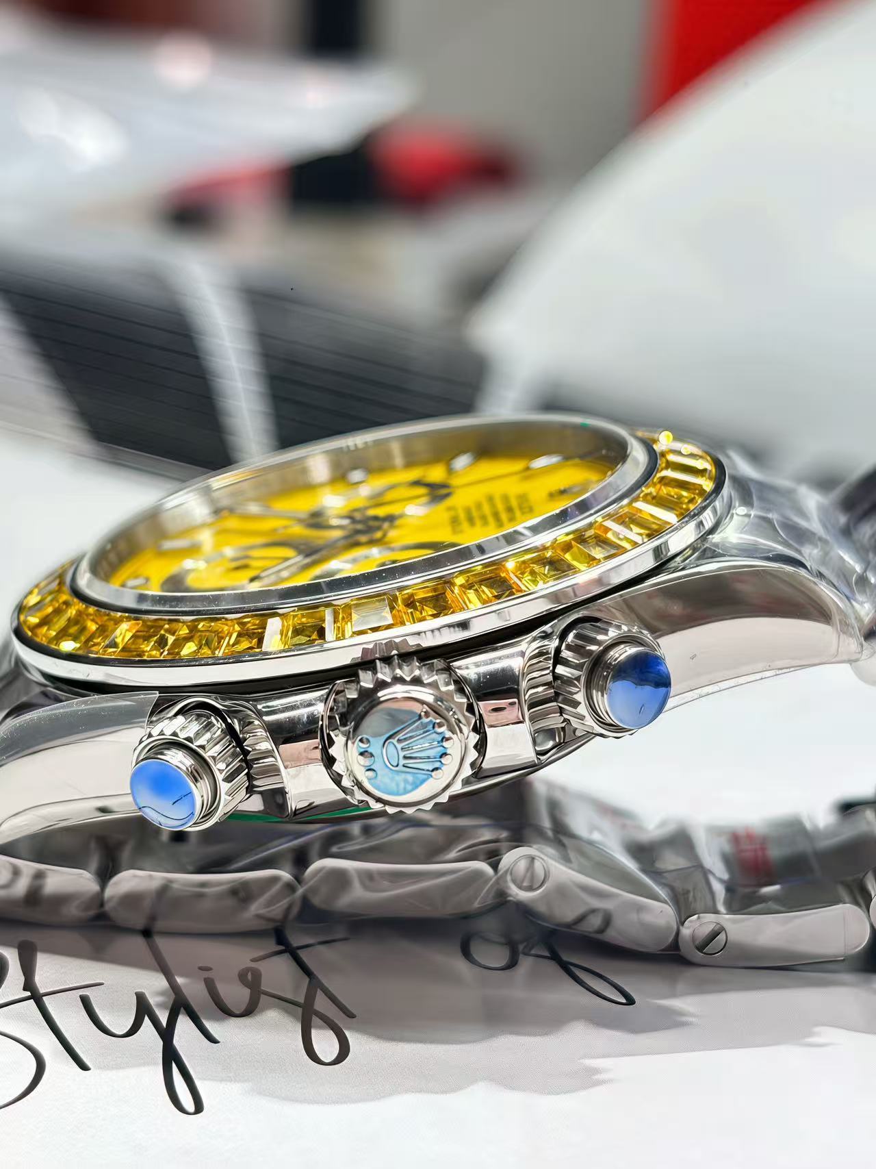 Rolex Daytona Yellow Dial Diamond Bezel Watch