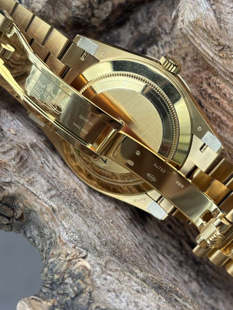 Rolex Day-Date 40 Yellow Gold Black Diamond Dial
