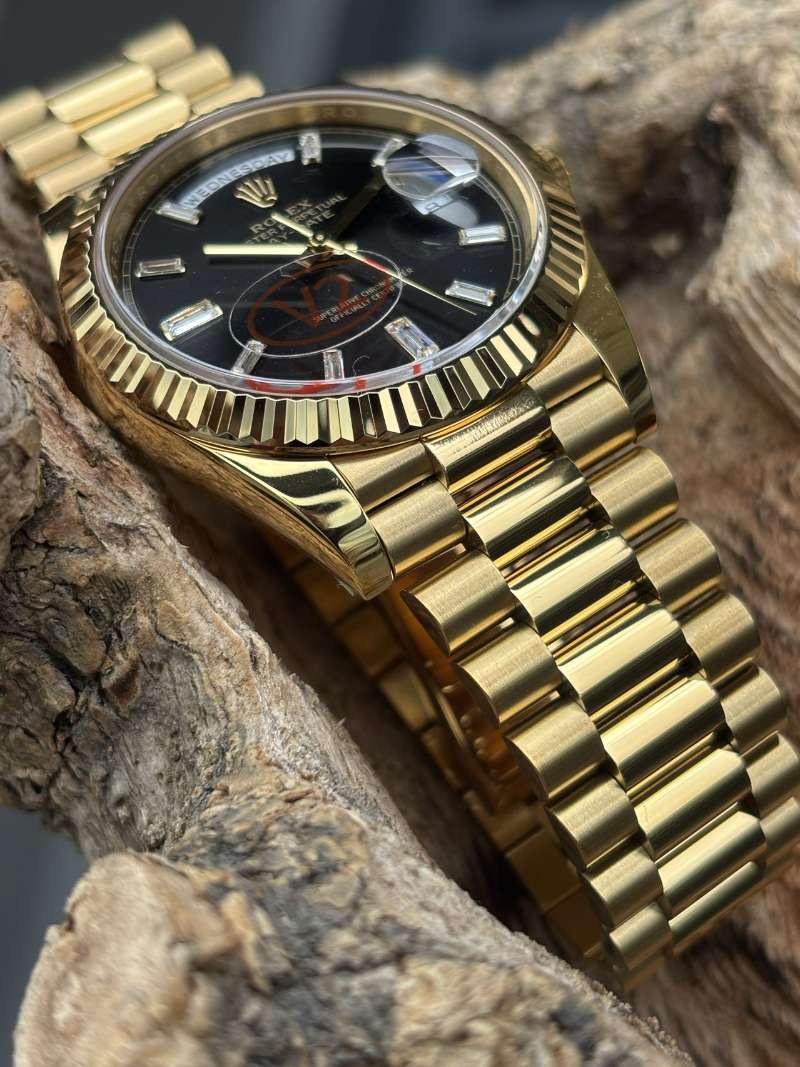 Rolex Day-Date 40 Yellow Gold Black Diamond Dial