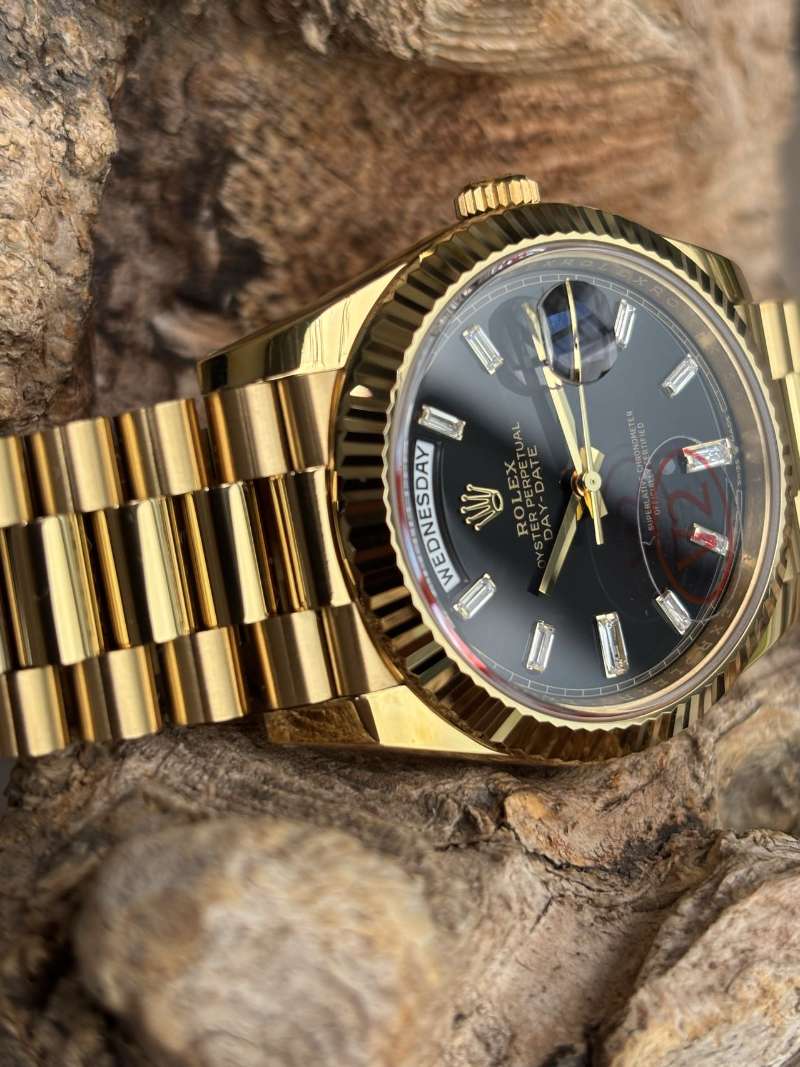 Rolex Day-Date 40 Yellow Gold Black Diamond Dial