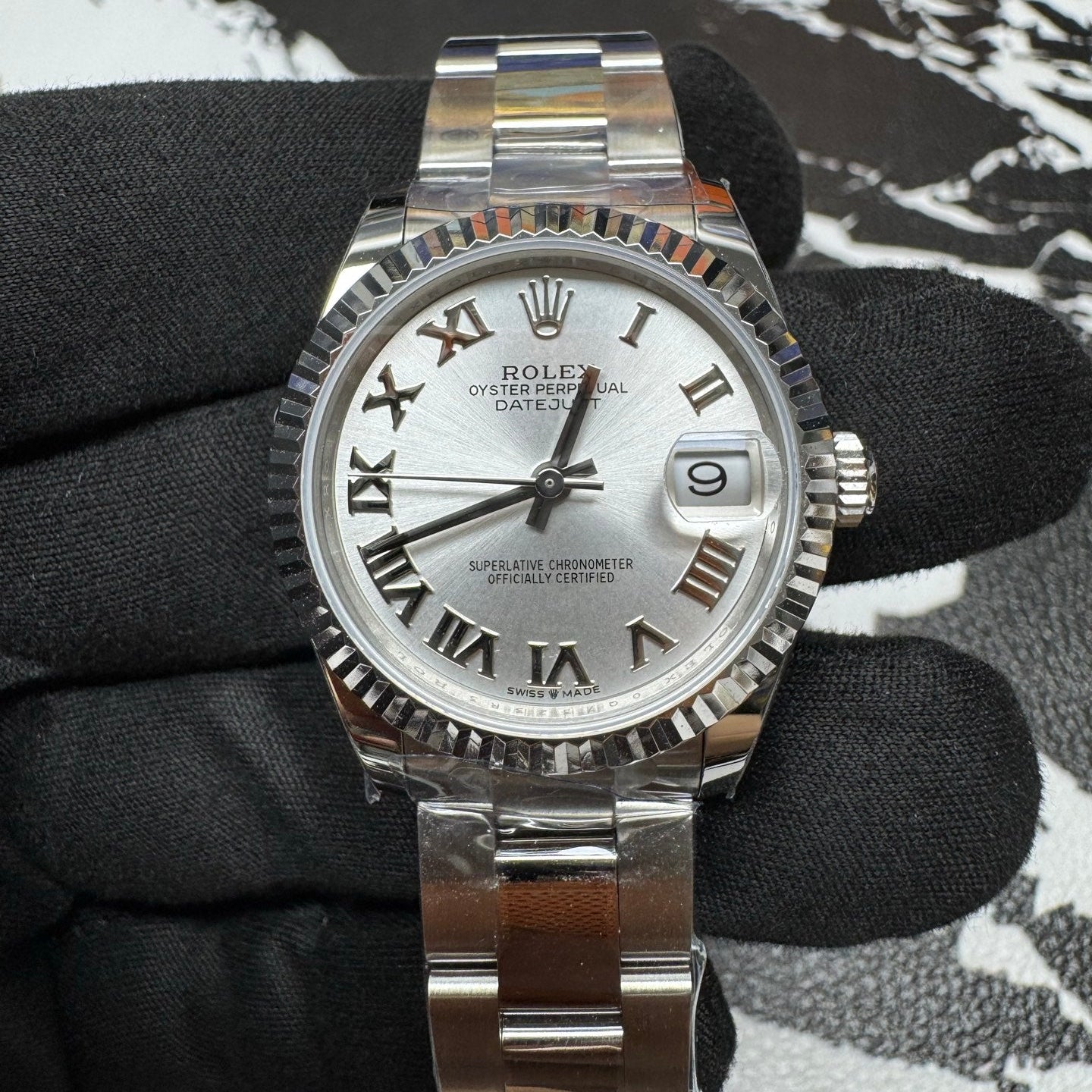 Rolex Datejust 31 Silver Roman Dial Fluted Bezel