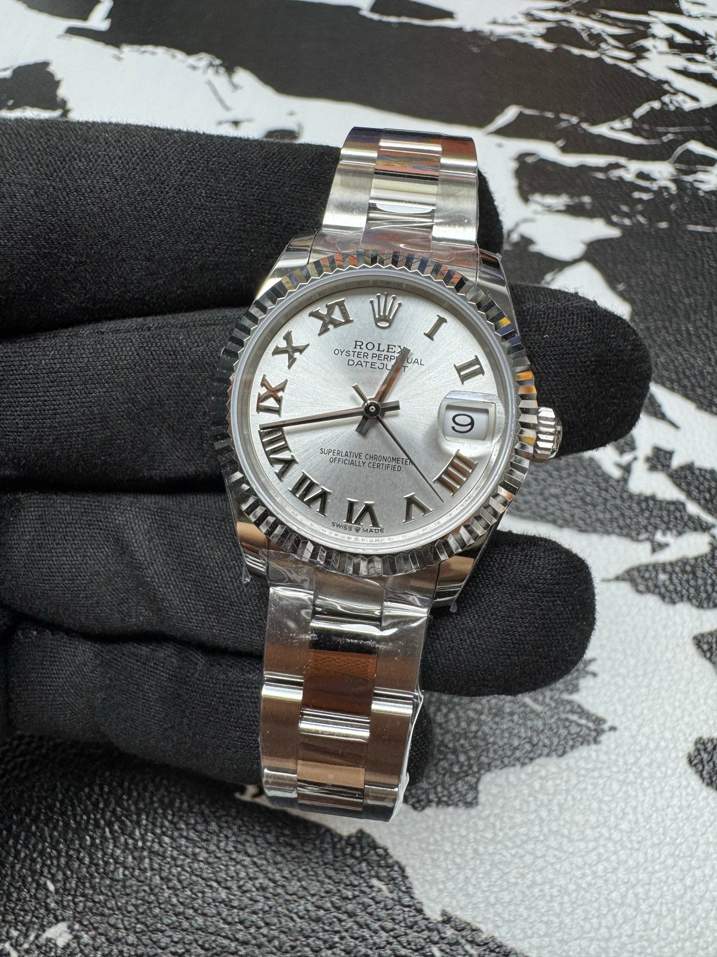 Rolex Datejust 31 Silver Roman Dial Fluted Bezel