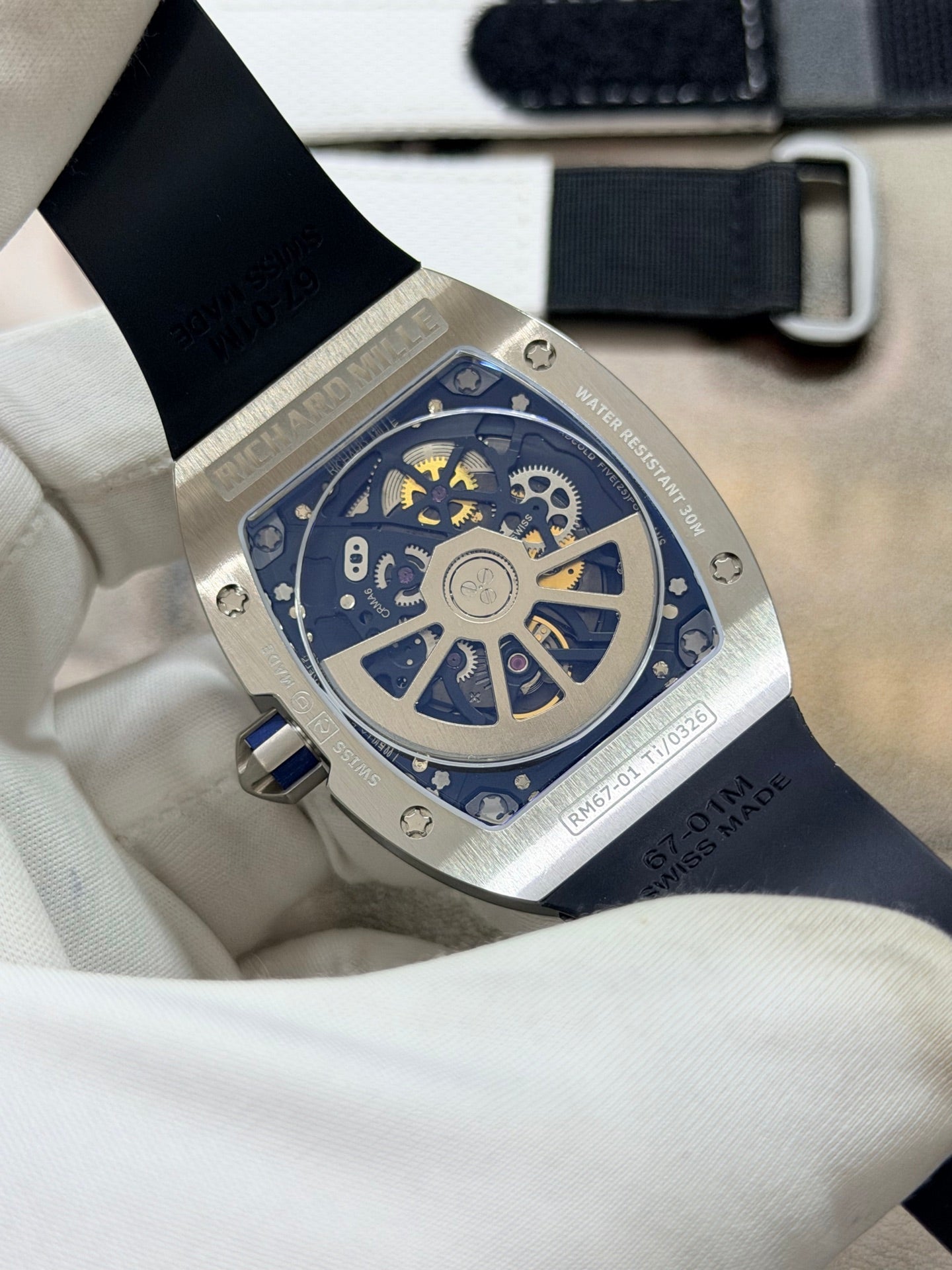 Richard Mille RM 67-01 Extra-Flat watch features a distinctive tonneau-shaped titanium case and a skeletonized dial. (Copy)