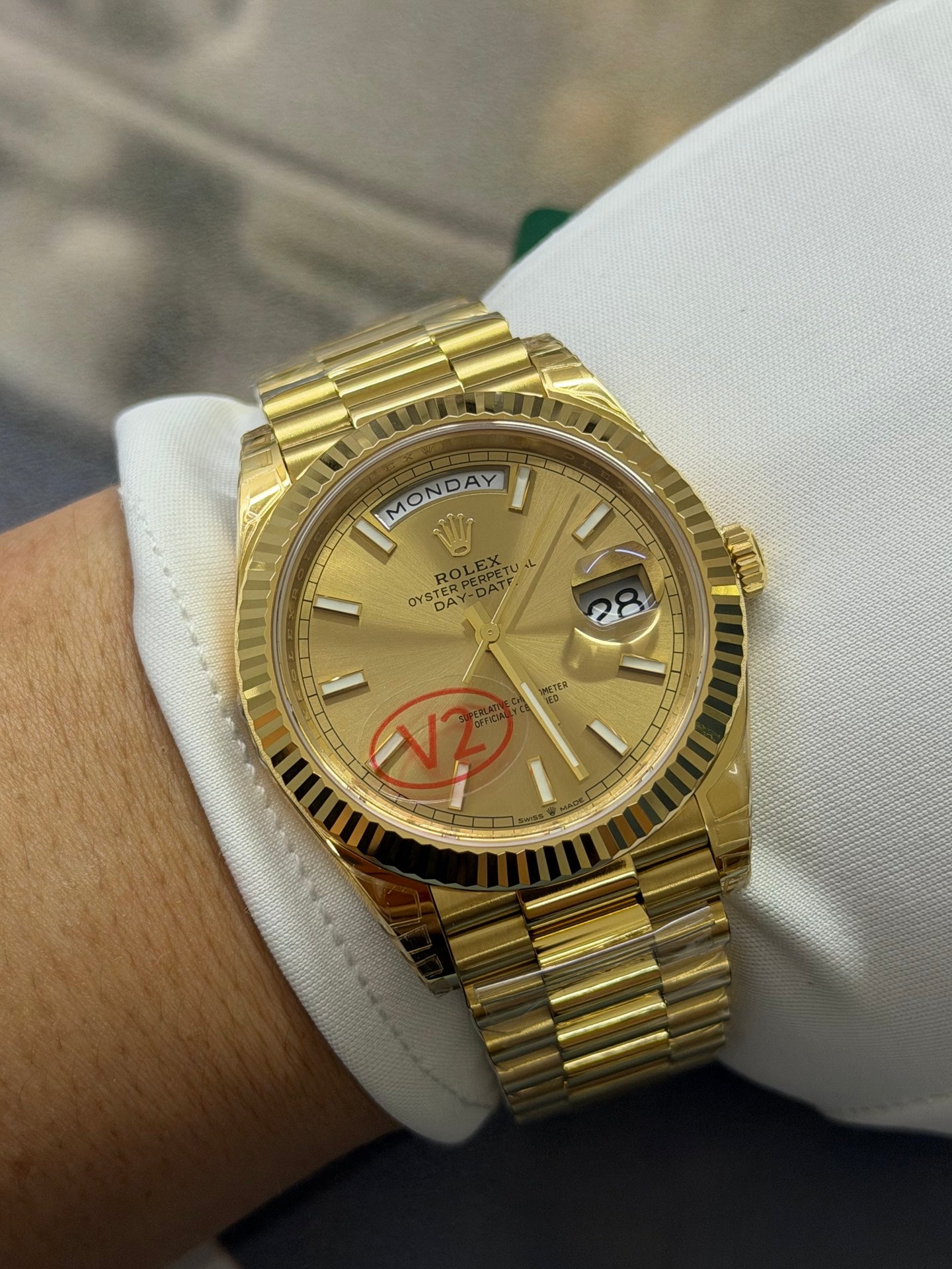 Rolex Day-Date 40 18K Yellow Gold with Champagne Stick Dial