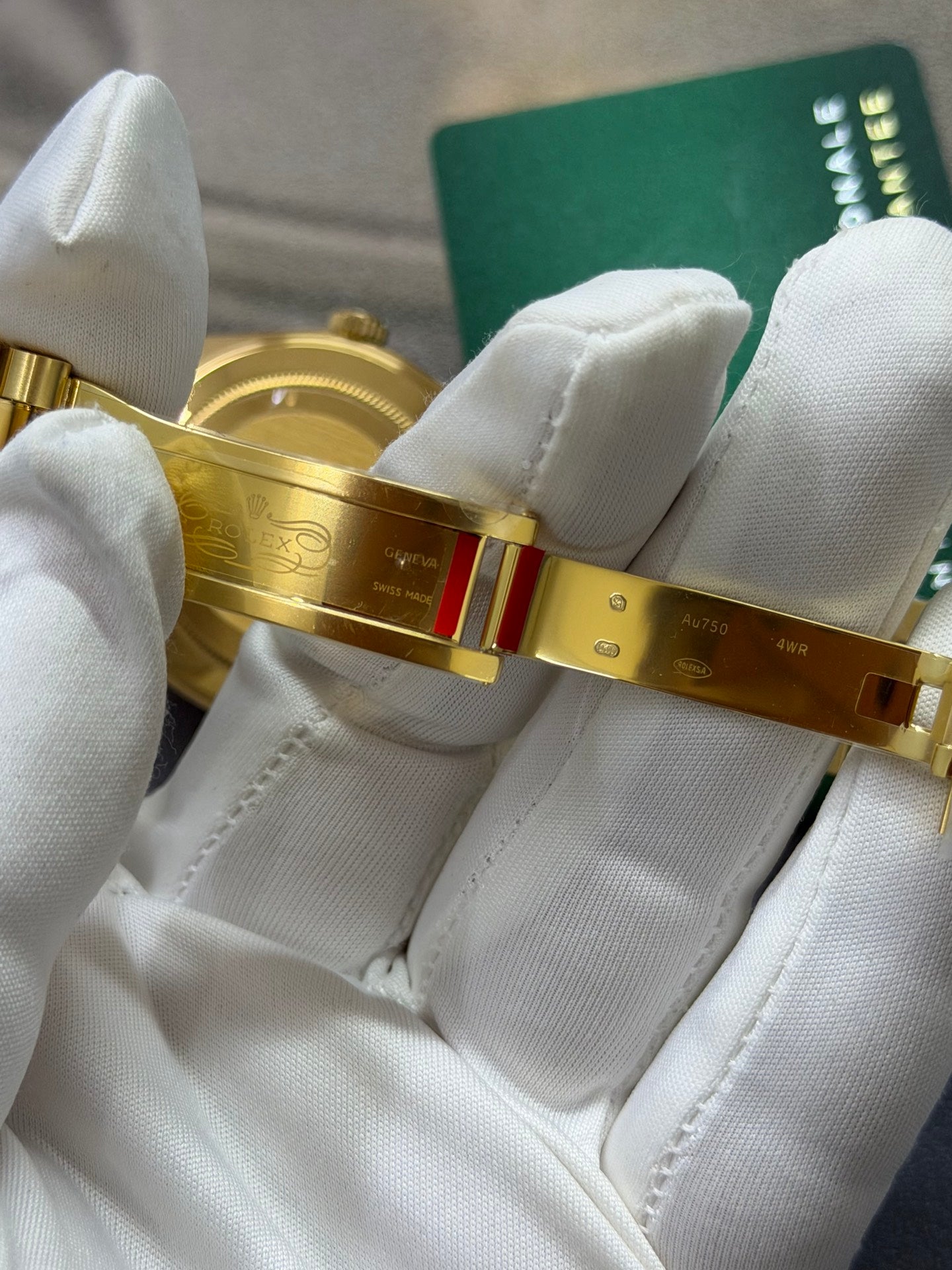 Rolex Day-Date 40 18K Yellow Gold with Champagne Stick Dial