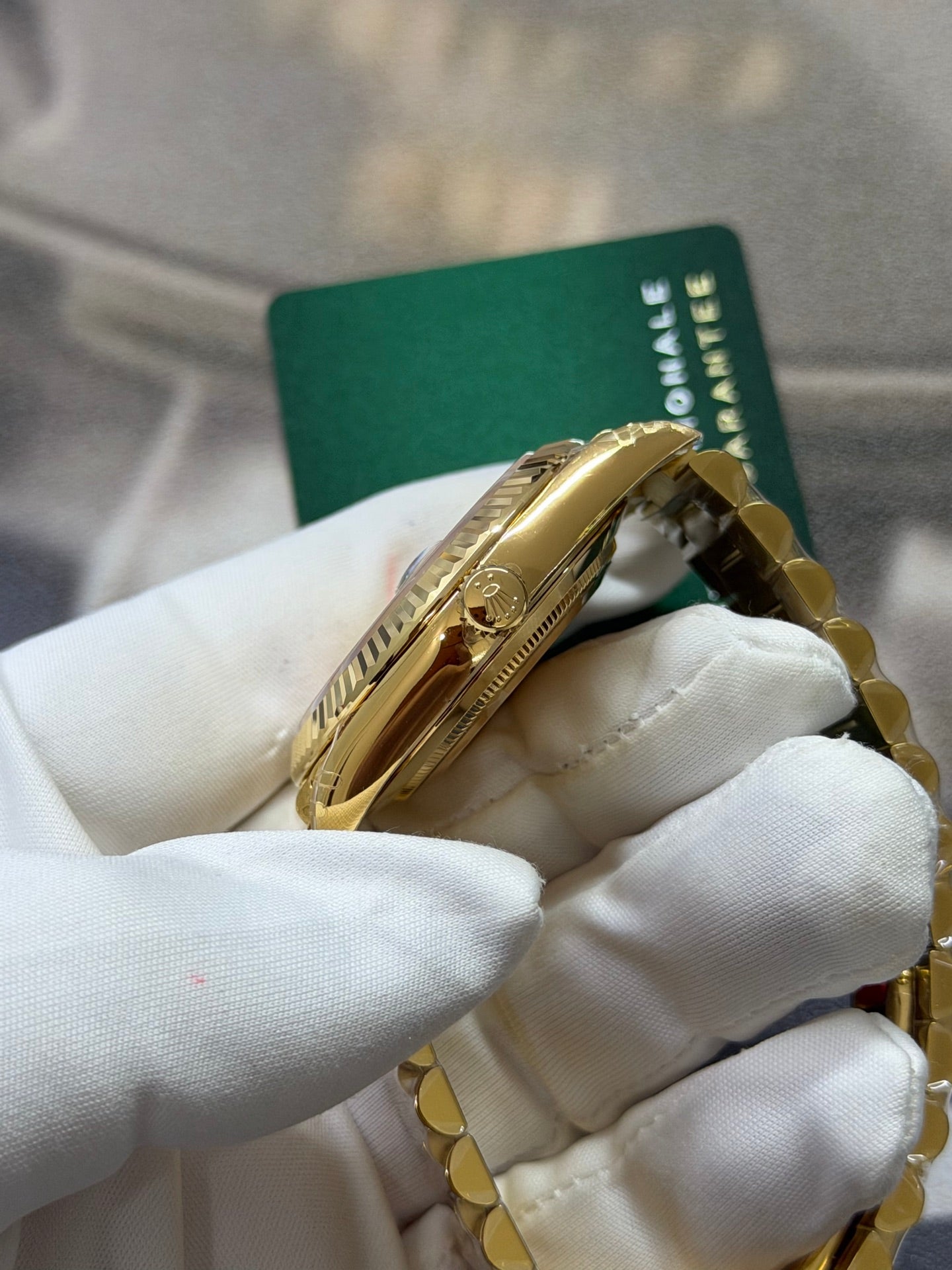 Rolex Day-Date 40 18K Yellow Gold with Champagne Stick Dial