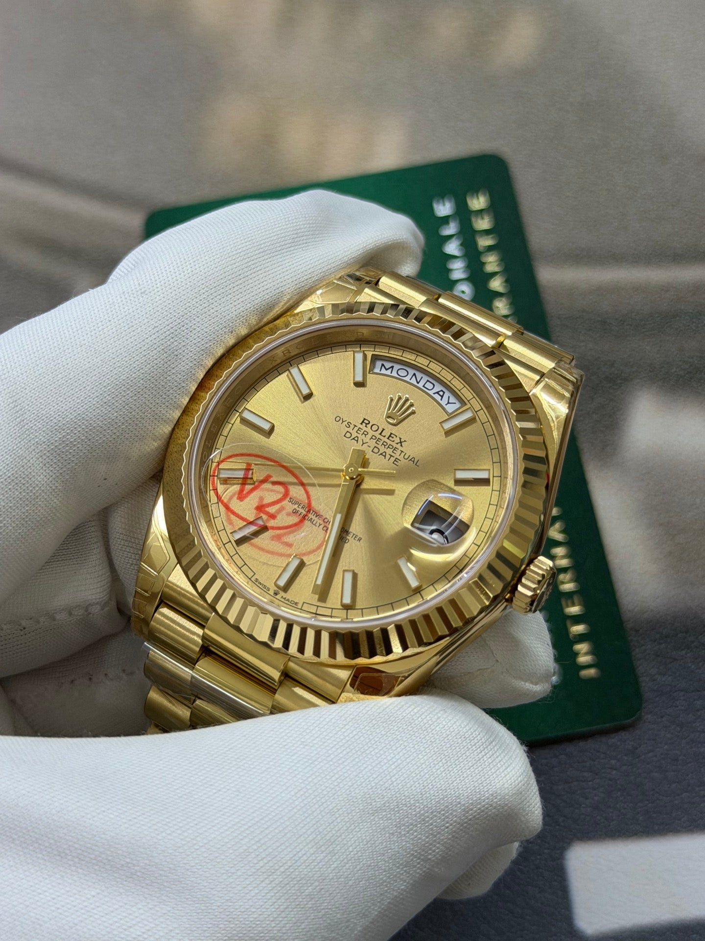 Rolex Day-Date 40 18K Yellow Gold with Champagne Stick Dial