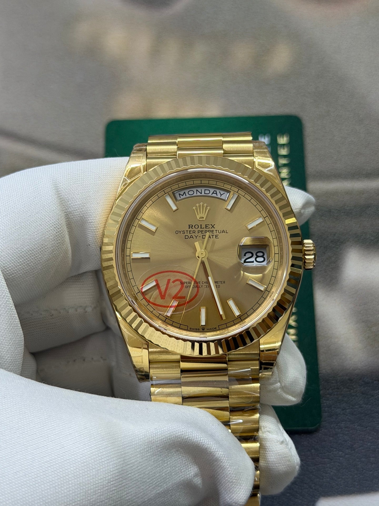 Rolex Day-Date 40 18K Yellow Gold with Champagne Stick Dial