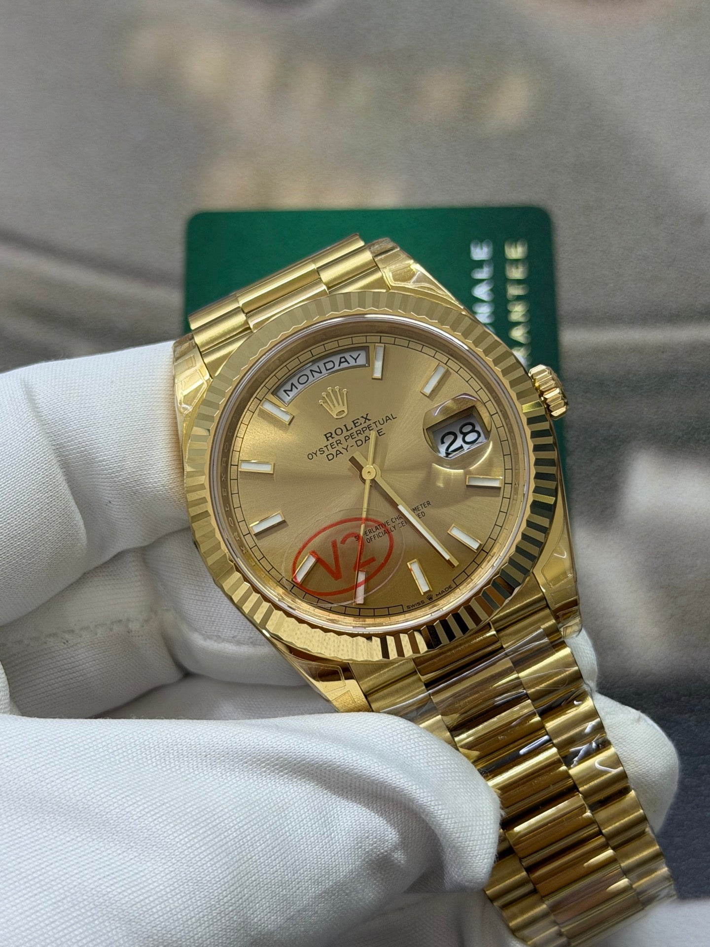 Rolex Day-Date 40 18K Yellow Gold with Champagne Stick Dial