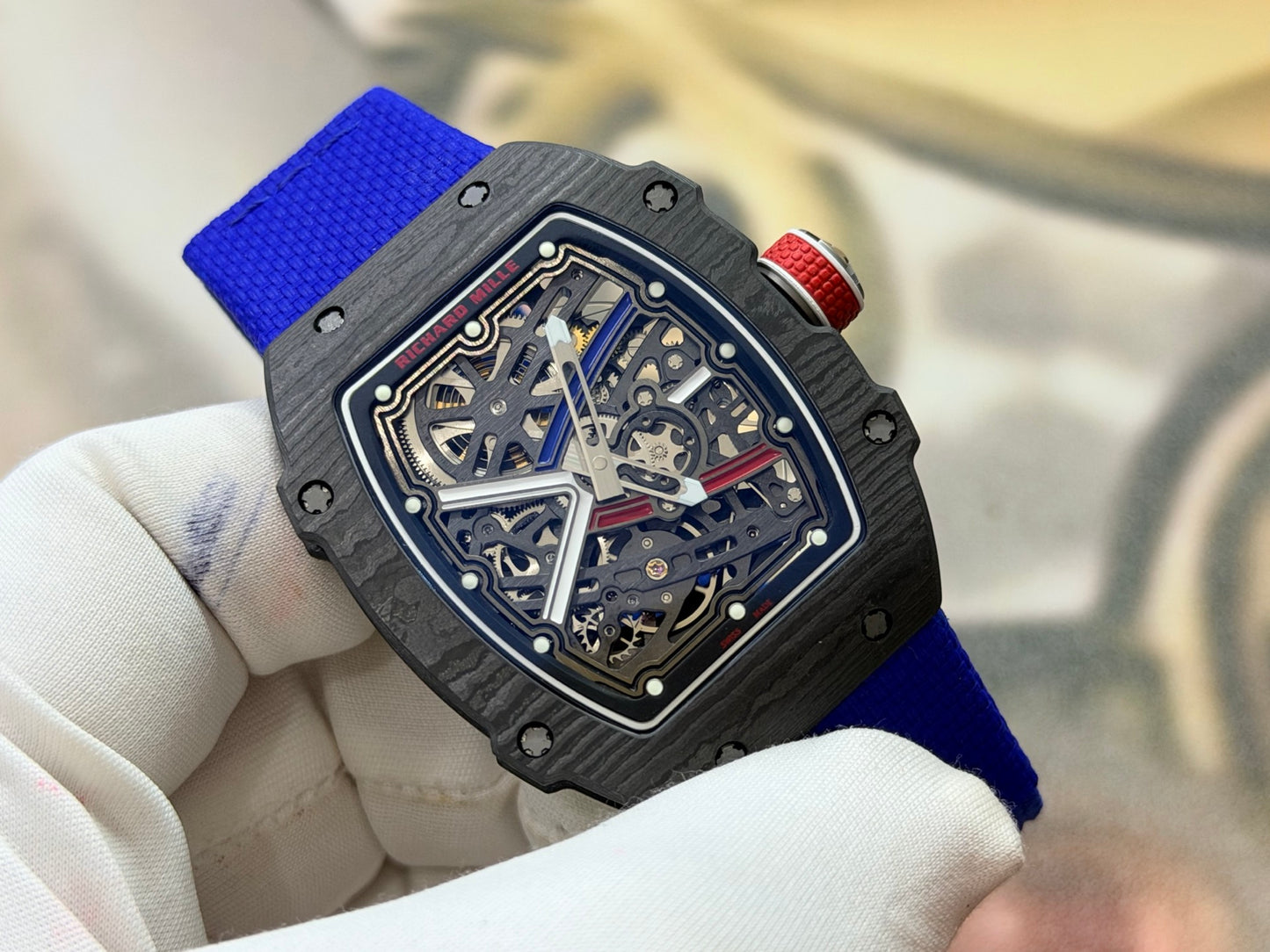This Richard Mille RM 67-02 Sebastien Ogier watch features a lightweight Carbon TPT case and a vibrant blue elastic strap.