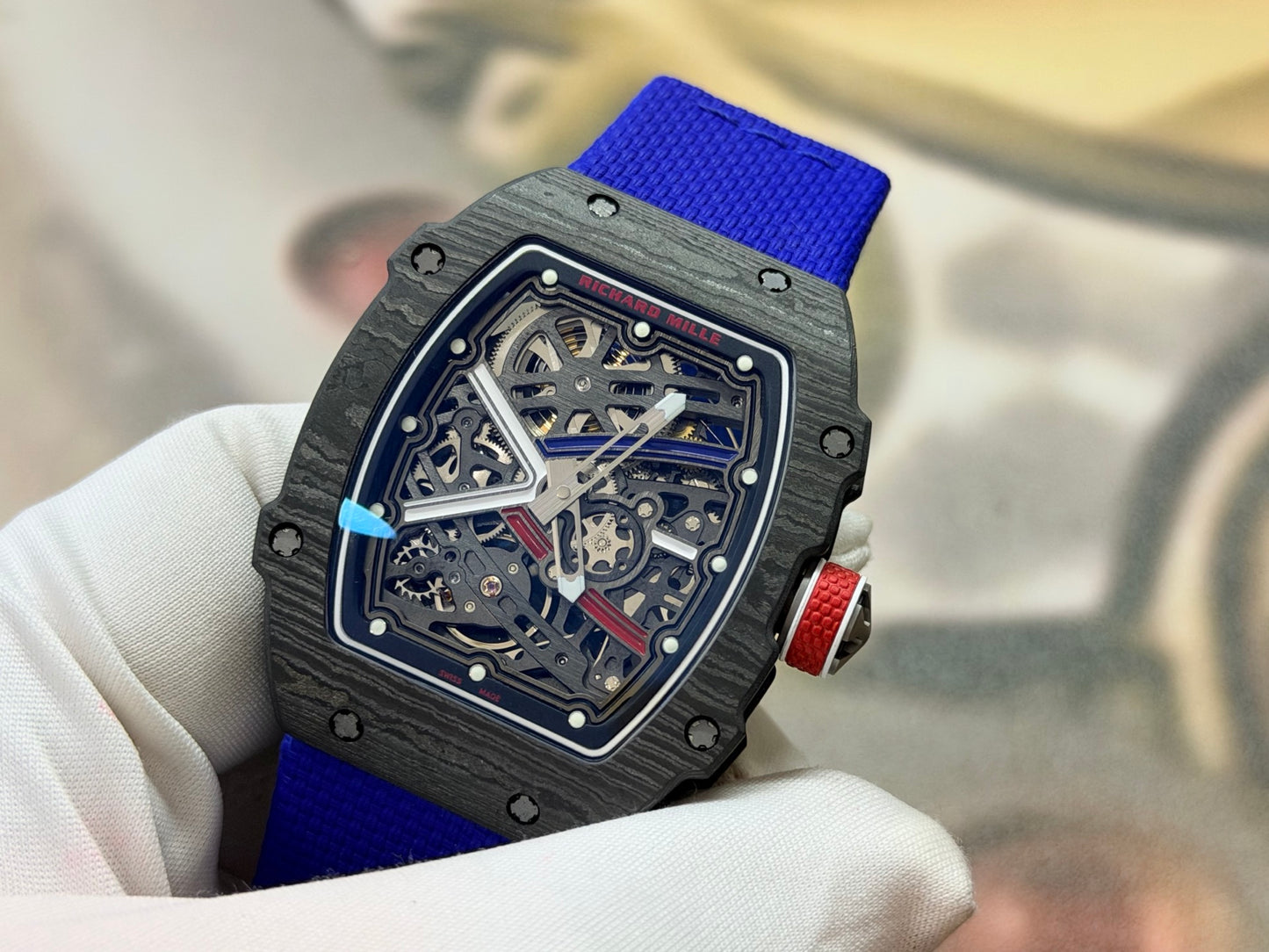 This Richard Mille RM 67-02 Sebastien Ogier watch features a lightweight Carbon TPT case and a vibrant blue elastic strap.