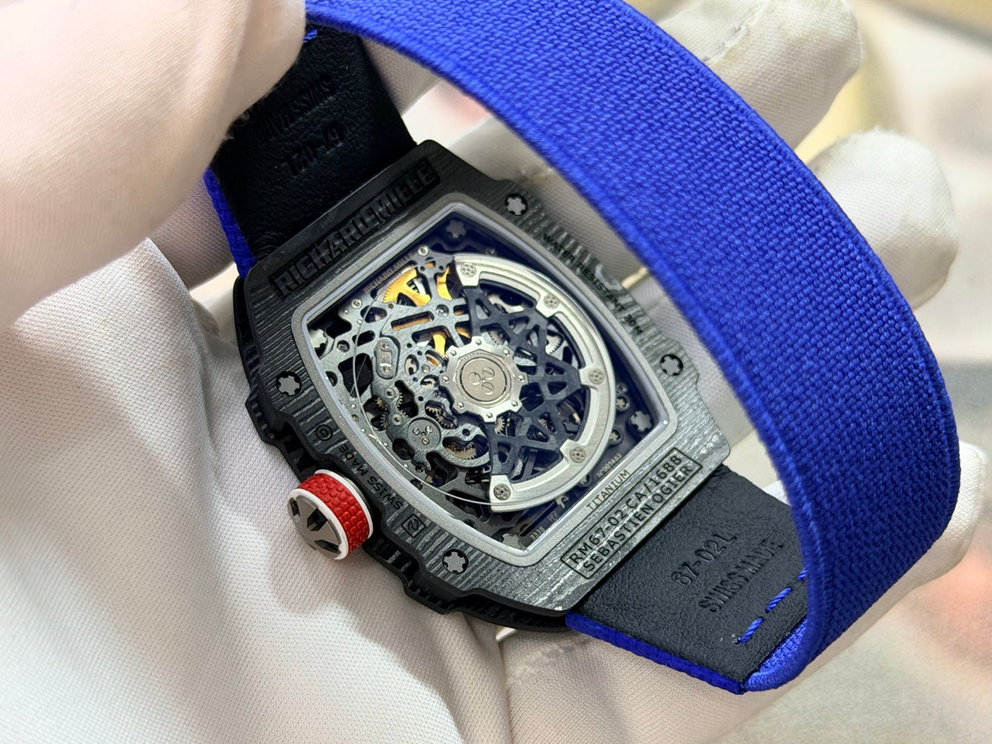 This Richard Mille RM 67-02 Sebastien Ogier watch features a lightweight Carbon TPT case and a vibrant blue elastic strap.