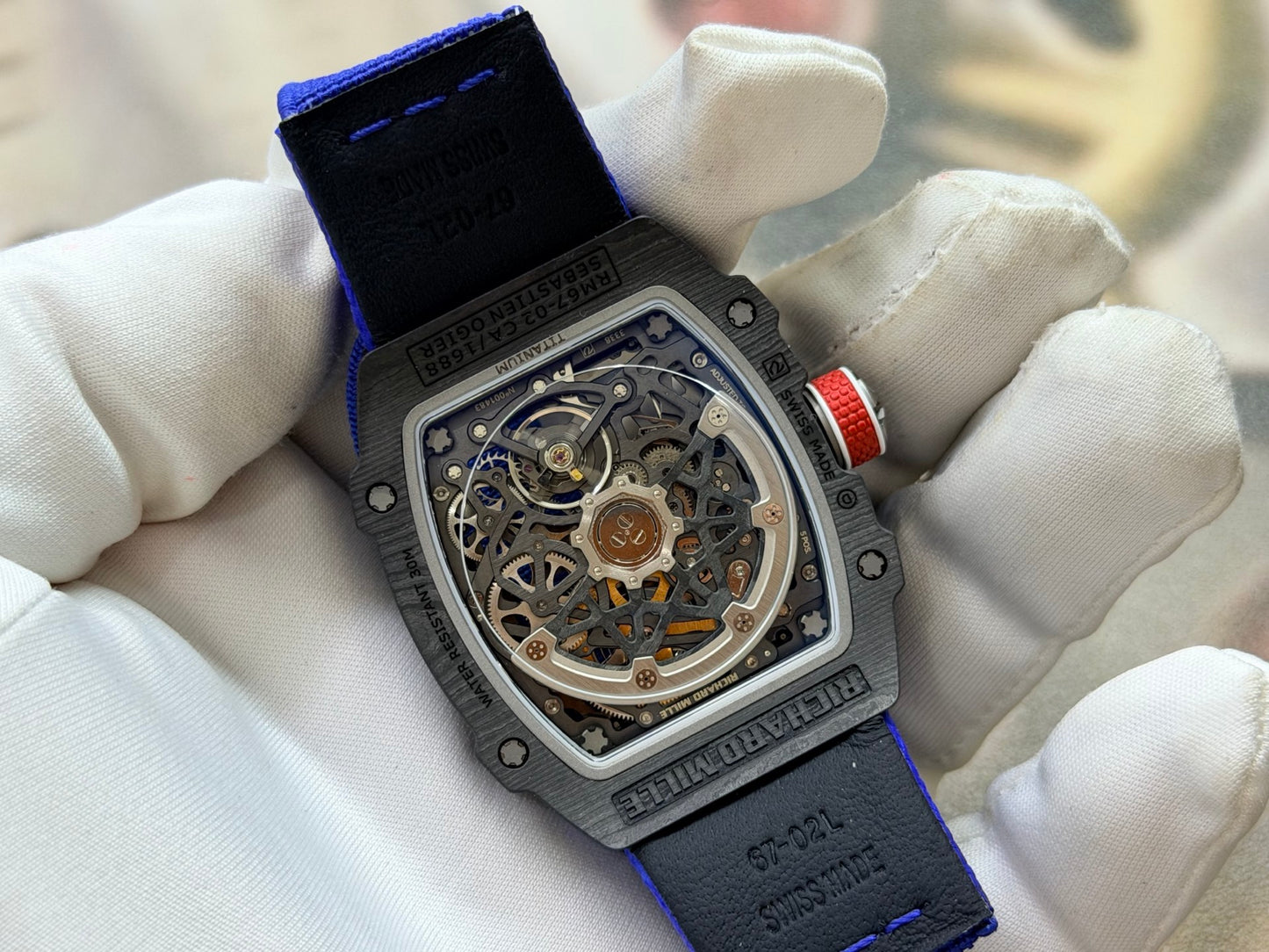 This Richard Mille RM 67-02 Sebastien Ogier watch features a lightweight Carbon TPT case and a vibrant blue elastic strap.