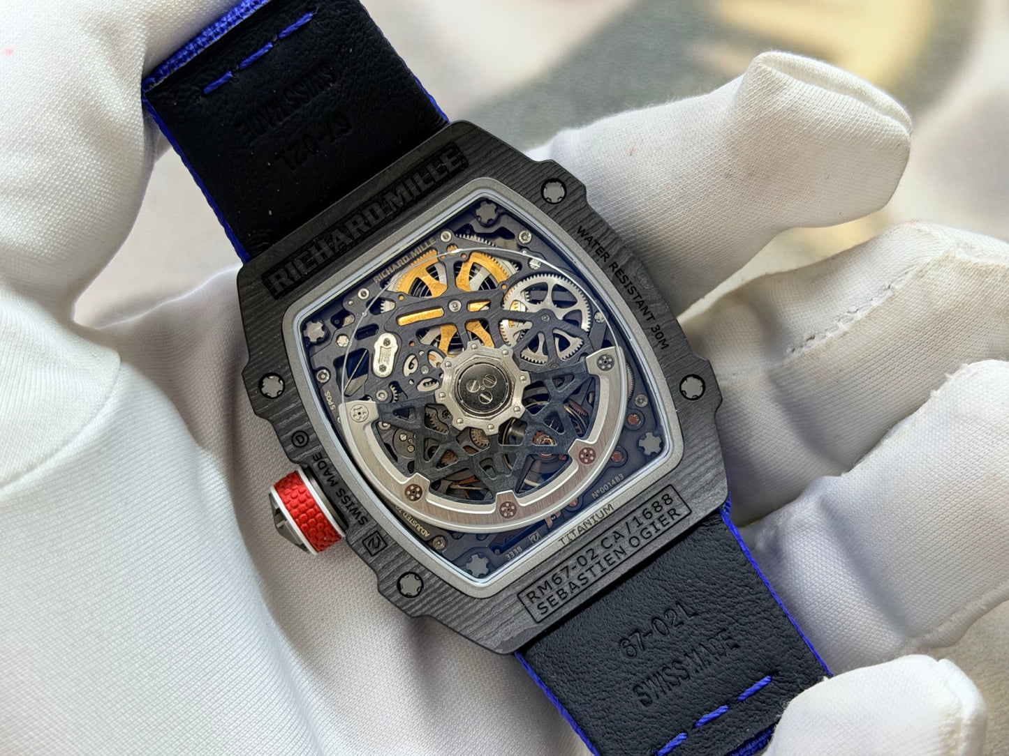 This Richard Mille RM 67-02 Sebastien Ogier watch features a lightweight Carbon TPT case and a vibrant blue elastic strap.