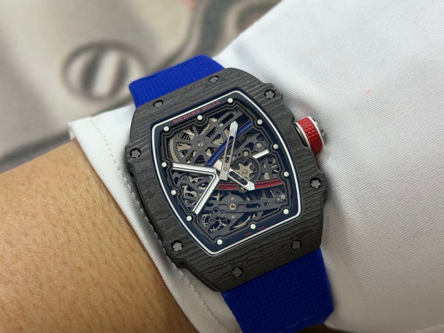 This Richard Mille RM 67-02 Sebastien Ogier watch features a lightweight Carbon TPT case and a vibrant blue elastic strap.