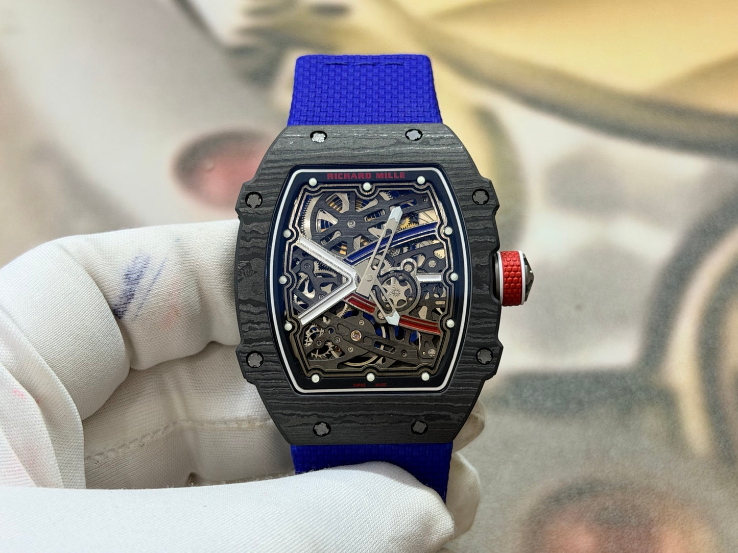 This Richard Mille RM 67-02 Sebastien Ogier watch features a lightweight Carbon TPT case and a vibrant blue elastic strap.
