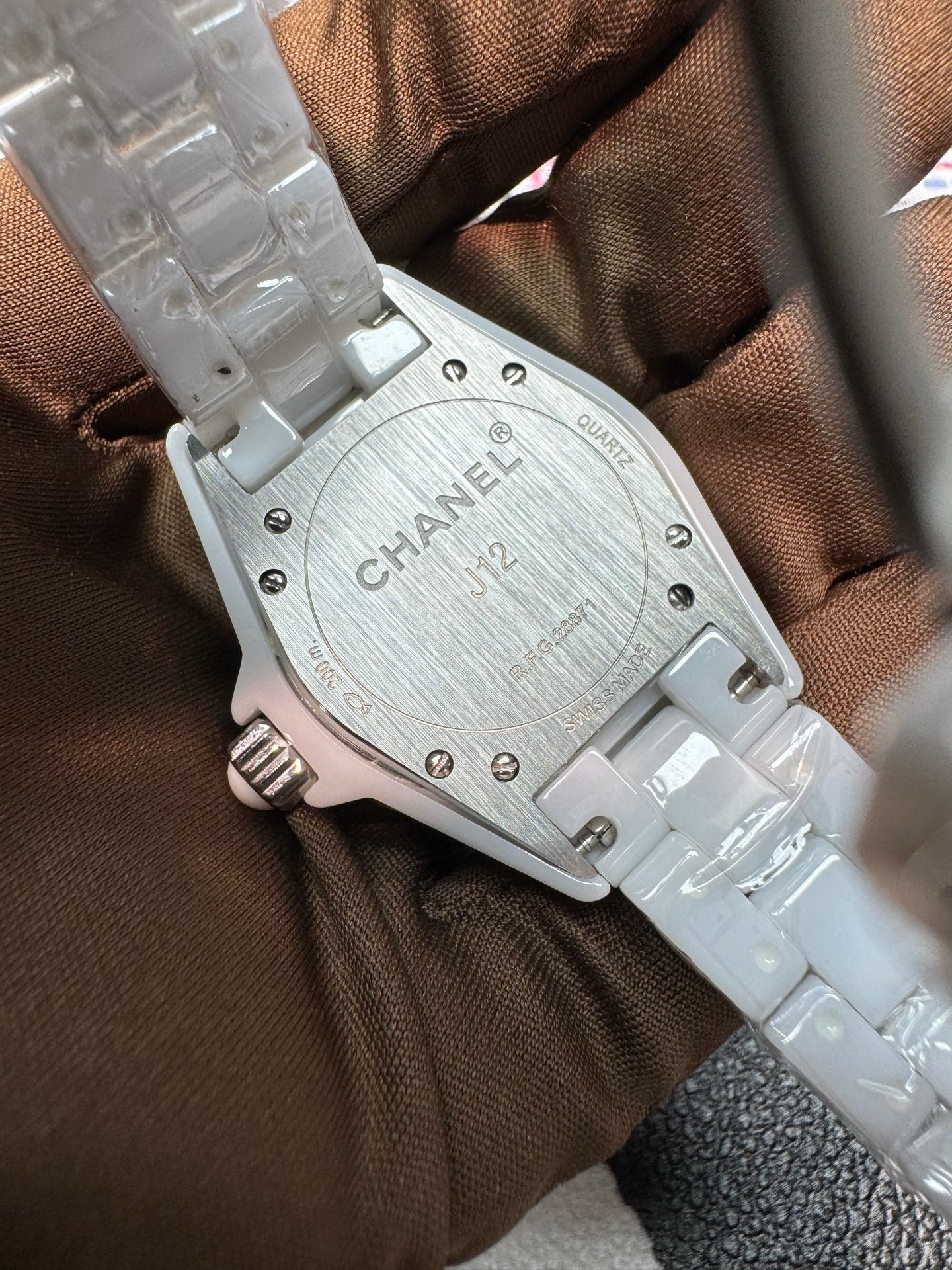 Chanel J12 33mm H2010 White Ceramic Watch with Pink Sapphire Bezel